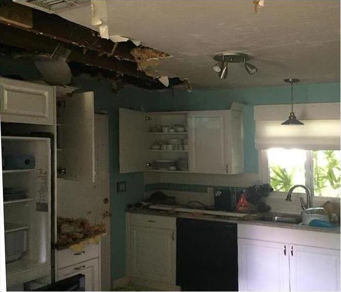 fire damage to ceiling in a kitchen in Orlando, FL
